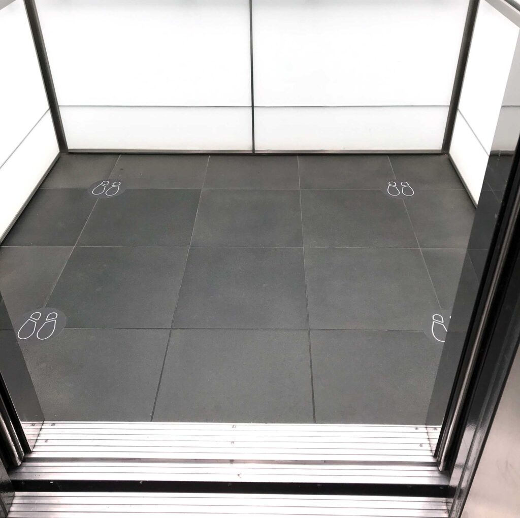 Elevator foot print floor graphics